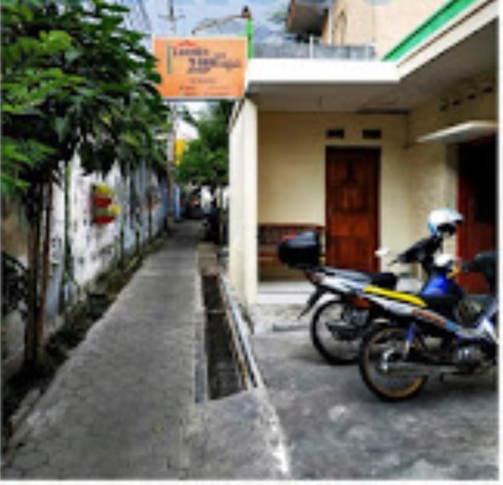 Losmen 2000 Tiga Jogjakarta Buitenkant foto